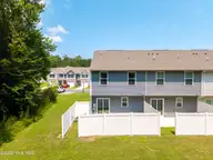 1301 Raven Way, Elizabeth City, NC 27909 — 3-bedroom townhome in Adams Landing, Elizabeth City, NC, photo 22 of 27: Fenced in yard