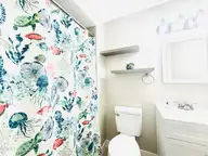 1505 Salter Path Road 325, Indian Beach, NC 28512 — 4-bedroom waterfront condo in Summer Winds Condominiums, Indian Beach, NC, photo 12 of 46: Shared Full Bath