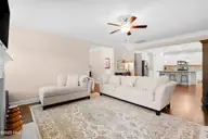 418 Goldenleaf Circle, Whispering Pines, NC 28327 — 4-bedroom home in Summerfield at Arrowstone, Whispering Pines, NC, photo 13 of 47: living room