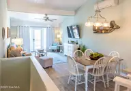 201 Freeman Lane C, Atlantic Beach, NC 28512 — 2-bedroom waterfront townhome in Club Colony, Atlantic Beach, NC, photo 10 of 33: Living & Dining