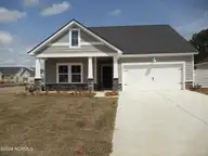 8740 NW Nashville Drive NW 1218- St. Phillips, Calabash, NC 28467 — 4-bedroom home in Brunswick Plantation, Calabash, NC, photo 2 of 11: Front Elevation