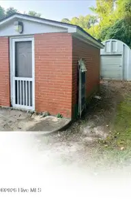 1210 Meadowood Drive, Kinston, NC 28501 — 4-bedroom home in Perry Park Extension, Kinston, NC, photo 8 of 41: Storage buildings