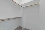69 N Rippling Court, Smithfield, NC 27577 — 3-bedroom home in Waterview, Smithfield, NC, photo 20 of 28: Master Closet