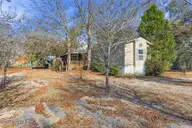 2186 Forest Drive SW, Supply, NC 28462 — 2-bedroom manufactured home in Forest Hills, Supply, NC, photo 2 of 26: side
