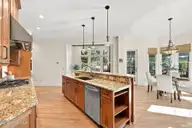 70 Royal Dublin Downs, Pinehurst, NC 28374 — 4-bedroom waterfront home in National, Pinehurst, NC, photo 14 of 53: Kitchen open to Family Room