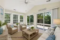 1007 Barkentine Drive, New Bern, NC 28560 — 3-bedroom home in Fairfield Harbour, New Bern, NC, photo 12 of 60: Sunroom with AI Generated Furnishings