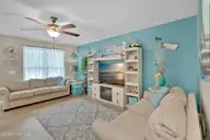 129 NE 13th Street, Oak Island, NC 28465 — 3-bedroom home, Oak Island, NC, photo 9 of 68: Living Room