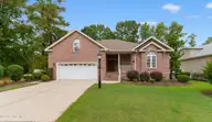 8865 Smithfield Drive NW, Calabash, NC 28467 — 4-bedroom home in Brunswick Plantation, Calabash, NC, photo 1 of 38