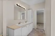 758 Wetherington Landing Road, Stella, NC 28582 — 3-bedroom manufactured home, Stella, NC, photo 22 of 49: Double vanities w/ porcelain sinks