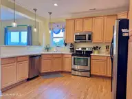 118 Shell Drive West, Emerald Isle, NC 28594 — 5-bedroom waterfront townhome, Emerald Isle, NC, photo 13 of 42: 118 Shell Dr Kitchen