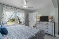 920 E Pelican Drive, Oak Island, NC 28465 — 3-bedroom waterfront home in E. Long Beach, Oak Island, NC, photo 18 of 46: 18-web-or-mls-BTS02497