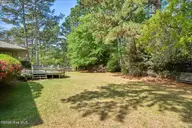 32 Bogie Drive, Whispering Pines, NC 28327 — 3-bedroom home in Whispering Pines, Whispering Pines, NC, photo 8 of 63: 09-11_32 Bogie Dr., WP_Exterior_Spring_L