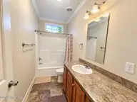 673 Pecan Road, Dudley, NC 28333 — 3-bedroom home, Dudley, NC, photo 9 of 13: Hall Bathroom