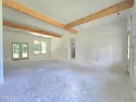 203 Gaston Drive, Elizabeth City, NC 27909 — 3-bedroom waterfront home in Newbegun Land, Elizabeth City, NC, photo 7 of 18: Great Room view 4