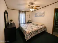 6749 Richardson Drive NW, Ocean Isle Beach, NC 28469 — 3-bedroom manufactured home in Pinewood Forest Grove, Ocean Isle Beach, NC, photo 19 of 28