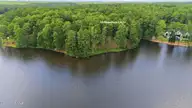 55 Apawamis Circle, Pinehurst, NC 28374 — waterfront lot in CCNC, Pinehurst, NC, photo 1 of 19: 55 Apawamis Circle Aerial