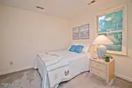 129 Indigo Drive, Emerald Isle, NC 28594 — 3-bedroom home in Bluewater Bay, Emerald Isle, NC, photo 13 of 29: Bedroom 1