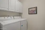 7429 Prestwick Court SW, Sunset Beach, NC 28468 — 3-bedroom home in Sandpiper Bay, Sunset Beach, NC, photo 23 of 41: Laundry Room