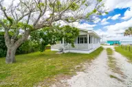1096 Salter Path Road, Salter Path, NC 28512 — 4-bedroom waterfront home in Salter Path, Salter Path, NC, photo 5 of 30: 1-web-or-mls-1086-salter-path-rd-1