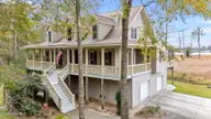 204 Tupelo Lane, Washington, NC 27889 — 3-bedroom waterfront home in Pamlico Plantation, Washington, NC, photo 2 of 44: Side