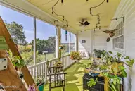 1323 Northside Road, Elizabeth City, NC 27909 — 4-bedroom home, Elizabeth City, NC, photo 23 of 72: Side Screened Porch