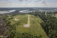 105 16 Southern Marsh Way, Stella, NC 28582 — waterfront lot in Stella Landing, Stella, NC, photo 1 of 18: 1 Stella Landing Drone 5, Stella NC 2858