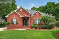 1119 Grandiflora Drive, Leland, NC 28451 — 3-bedroom home in Magnolia Greens, Leland, NC, photo 1 of 36