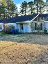 708 Pinewood Drive, Jacksonville, NC 28546 — 2-bedroom townhome in Pinewood Downs, Jacksonville, NC, photo 1 of 21: Front of House