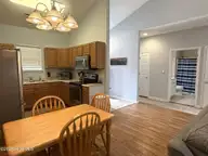 5069 Wyncie Wynd, Southport, NC 28461 — 2-bedroom condo in South Harbour Village, Southport, NC, photo 6 of 24: Dining room