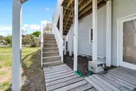 402 Dolphin Street, Sunset Beach, NC 28468 — 3-bedroom waterfront home, Sunset Beach, NC, photo 13 of 53: Steps to main entrance