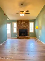234 Cedar Creek Drive, Jacksonville, NC 28540 — 2-bedroom townhome in Cedar Creek, Jacksonville, NC, photo 2 of 15: 5 living room 234 Cedar Creek Dr Jackson