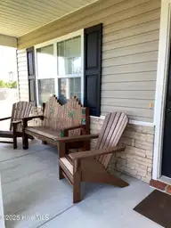 309 Basil Court, Hubert, NC 28539 — 3-bedroom home in Sagewood, Hubert, NC, photo 21 of 27: 309 basil front porch