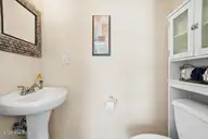 7650 Front Street Unit 3, Sunset Beach, NC 28468 — 2-bedroom townhome in Seaside Village, Sunset Beach, NC, photo 11 of 37: Downstairs Half Bath