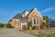 642 Chimney Hill Way, Rocky Mount, NC 27804 — 4-bedroom home in Belmont Lake Preserve, Rocky Mount, NC, photo 4 of 67: Side Exterior