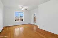 120 Grace Point Drive, Leland, NC 28479 — 2-bedroom townhome in Mallory Creek Plantation, Leland, NC, photo 18 of 53: 12_living room 1