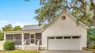 221 NE 60th Street, Oak Island, NC 28465 — 3-bedroom home in Tranquil Harbor, Oak Island, NC, photo 1 of 76
