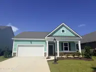 1241 Woodhouse Drive NW, Ash, NC 28420 — 4-bedroom home in Brunswick Plantation, Ash, NC, photo 1 of 26