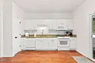 109 Oakleaf Drive, Pine Knoll Shores, NC 28512 — 3-bedroom waterfront home in Fairway Villas, Pine Knoll Shores, NC, photo 21 of 66: Kitchen