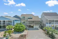 411 5th Street, Sunset Beach, NC 28468 — 4-bedroom home, Sunset Beach, NC, photo 1 of 50: 411 5th St, Sunset Beach, NC