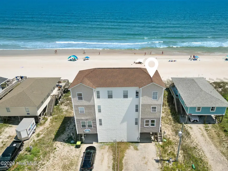 242 Sea Shore Drive, North Topsail Beach, NC 28460 — 5-bedroom waterfront townhome in Old Settlers Beach, North Topsail Beach, NC, photo 1 of 72