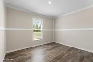 6812 Lewis Drive SE, Winnabow, NC 28479 — 3-bedroom manufactured home in Lewis Acres, Winnabow, NC, photo 23 of 27: Guest bedroom 2