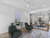 38 N District Avenue, Clayton, NC 27527 — 3-bedroom home in Flowers Plantation, Clayton, NC, photo 14 of 38: 017-1280x960-family-room