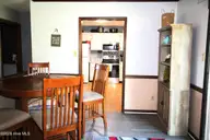 216 Ashwood Court, Havelock, NC 28532 — 3-bedroom home in Southern Terrace, Havelock, NC, photo 4 of 25: Dining into Kitchen