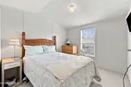 1530 Salter Path Road 15, Indian Beach, NC 28512 — 2-bedroom waterfront manufactured home in Tradewinds, Indian Beach, NC, photo 21 of 32: Guest bedroom