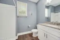 1858 E Boiling Spring Road, Southport, NC 28461 — 3-bedroom home in Boiling Spring Lakes, Southport, NC, photo 12 of 19: bathroom 2