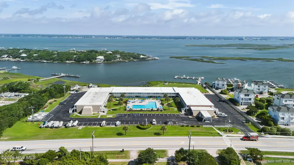 1918 W Fort Macon Road 233 Bogue Shores Condominium, Atlantic Beach, NC 28512 — 1-bedroom waterfront condo in Bogue Shores Condo, Atlantic Beach, NC, photo 1 of 23: 1-web-or-mls-DJI_20260527095336_0702_D