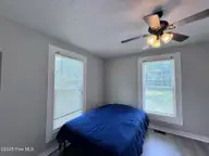 305 E Oak Street, Lake Waccamaw, NC 28450 — 3-bedroom home, Lake Waccamaw, NC, photo 21 of 44: Primary Bedroom