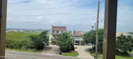 1702 E Fort Macon Road A, Atlantic Beach, NC 28512 — 3-bedroom townhome in Asbury Beach, Atlantic Beach, NC, photo 3 of 10: view from East unit