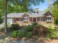 524 Admirals Court SE, Bolivia, NC 28422 — 3-bedroom waterfront home in River Run Plantation, Bolivia, NC, photo 4 of 76: 524AdmiralsCtAerials-212