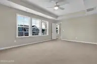 6830 Fellowship Drive, Leland, NC 28451 — 5-bedroom home in Grand Park, Leland, NC, photo 17 of 49: Primary Bedroom